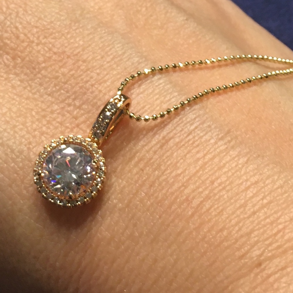 Gold plated 12mm cz necklace w cz pave trim.